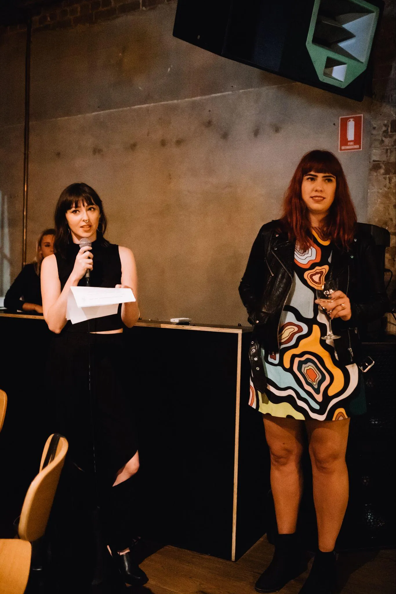 Alexandra Winters and co-host speak to audience