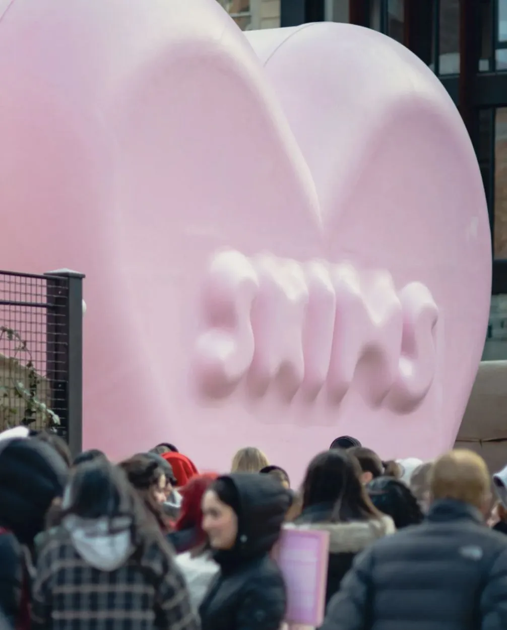 Closeup exterior photo of pink, heart shaped structure.